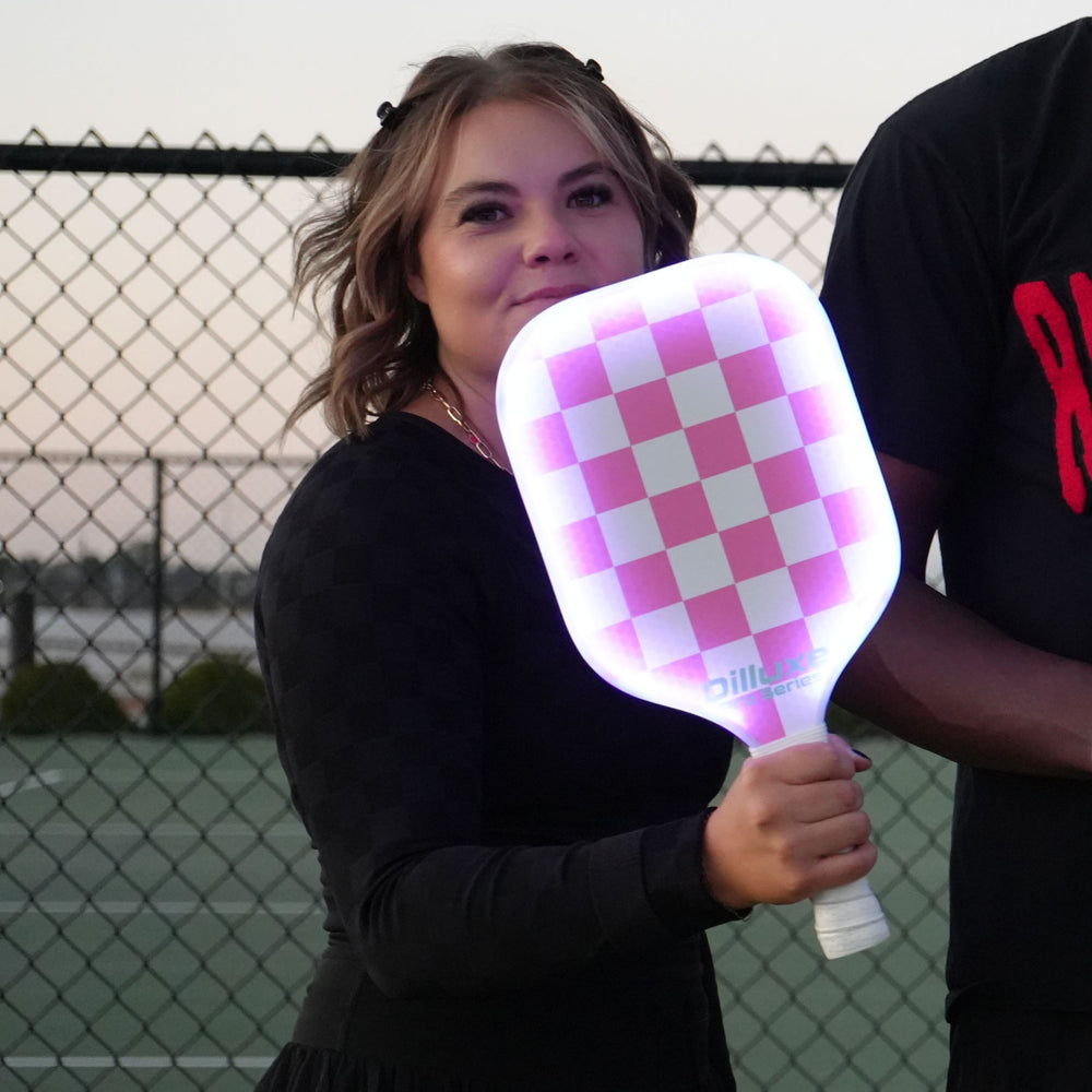 
                  
                    Pink Checker Glow Paddle
                  
                